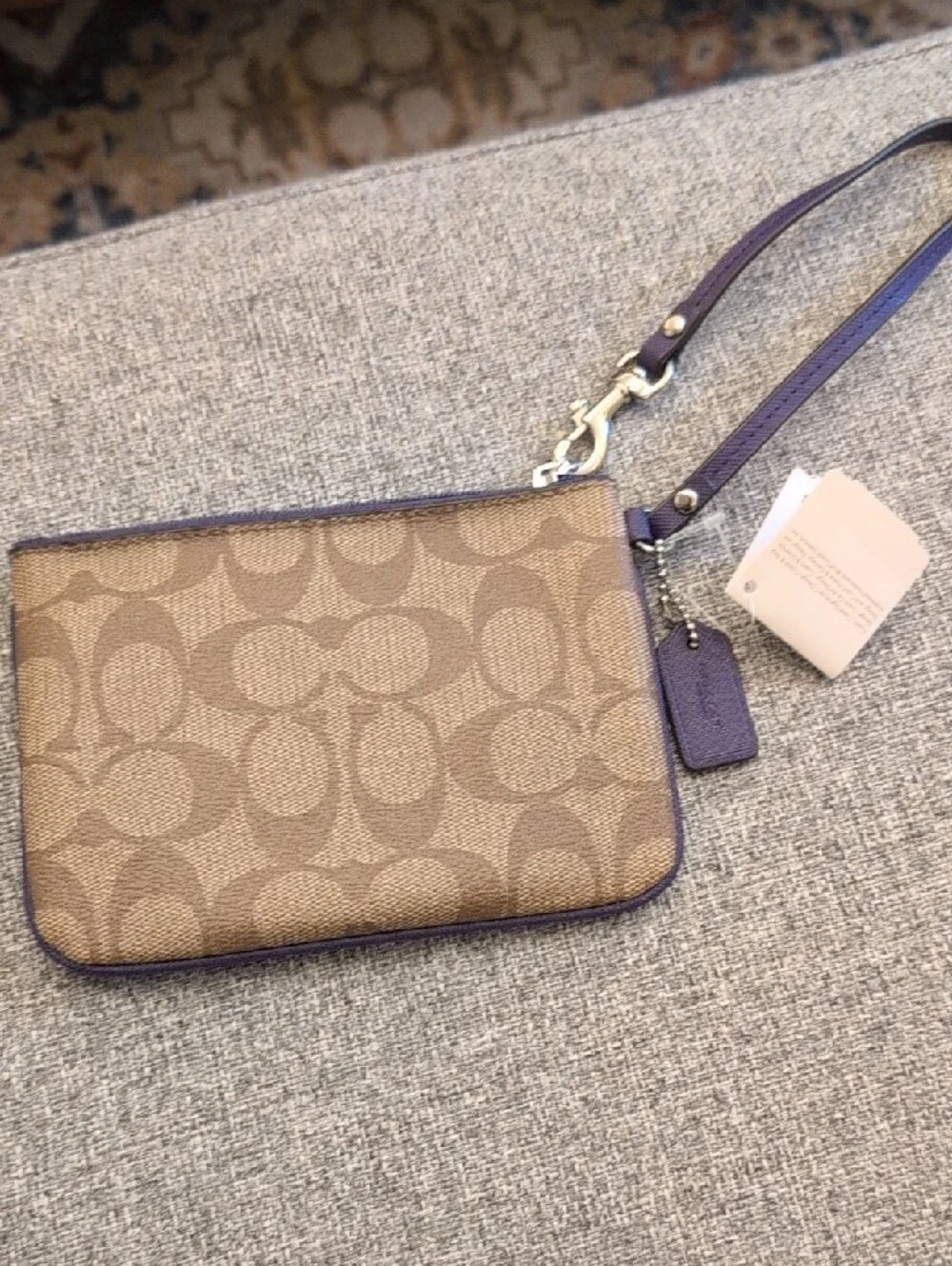 NWT Coach Khaki Signature Canvas Wristlet with Purple Trim